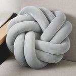 Coussin Noeud à Trou Gris